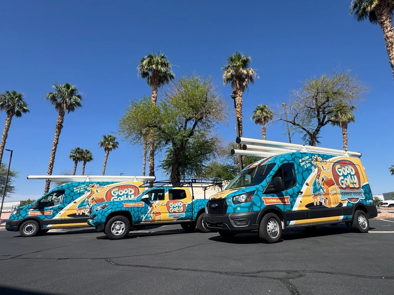 Las Vegas residential garage door service vans parked together