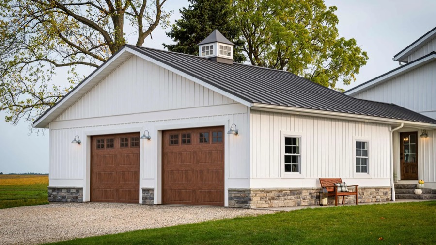 A Clopay Gallery raised-panel carriage-style garage door with a glazed top row